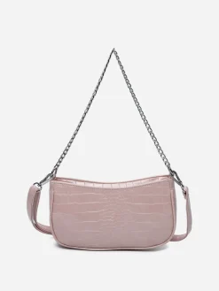La Modeuse Sac à main demi-lune verni Rose