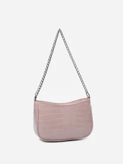 La Modeuse Sac à main demi-lune verni Rose