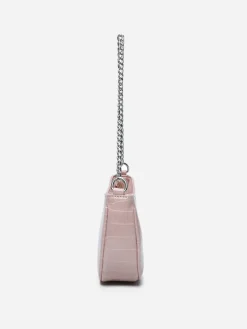 La Modeuse Sac à main demi-lune verni Rose