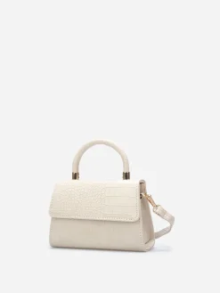 New La Modeuse Sac à main effet croco verni avec rabat Beige