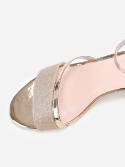 La Modeuse Sandales à brides vernies et pailletées Dorérose