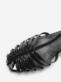 New La Modeuse Sandales ajourées et vernies Noir