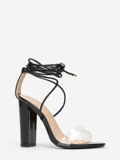 Online La Modeuse Sandales avec bride transparente et lanière Noir