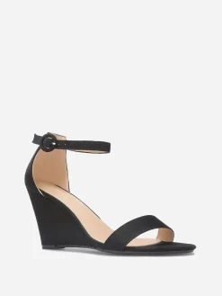 Online La Modeuse Sandales compensées en suédine Noir