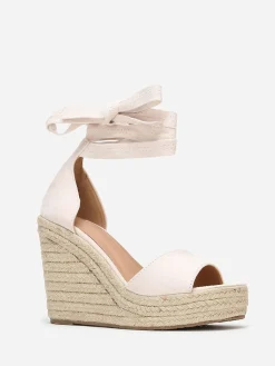 Discount La Modeuse Sandales crèmes à semelle compensée et liens Beige clair Beigeclair