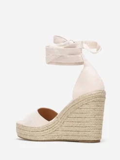 Discount La Modeuse Sandales crèmes à semelle compensée et liens Beige clair Beigeclair