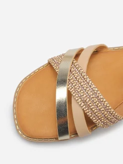 Discount La Modeuse Sandales plates à brides croisées et strass Doré