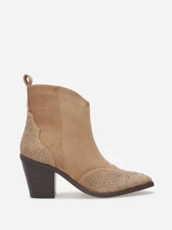 Online La Modeuse Santiags en suédine à strass Taupe