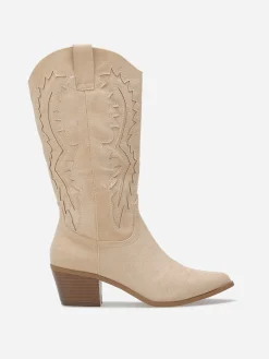 Hot La Modeuse Santiags en suédine à talon et surpiqûres Beige