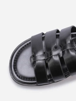 Online La Modeuse Spartiates à semelle crantée et bijou doré Noir