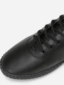 La Modeuse Tennis en simili  avec semelle en relief Noir