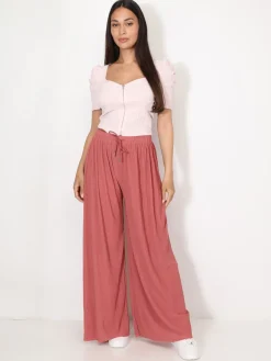 Online La Modeuse Top zippé à manches gigot Rose