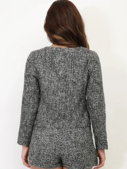 Sale La Modeuse Veste courte en tweed à boutons Noir